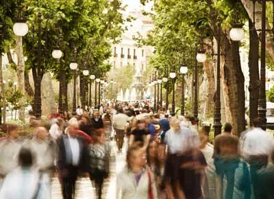 Urban tree-lined city street representing the Midwest commercial landscape